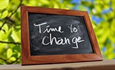 En tavla med texten "Time to change".