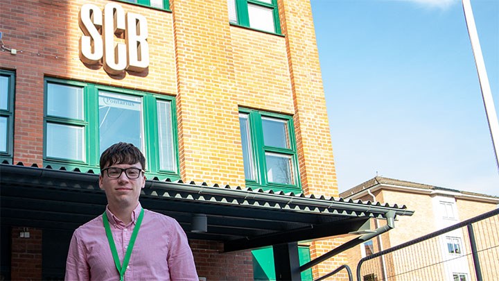 Jacob Kasche outside his work.