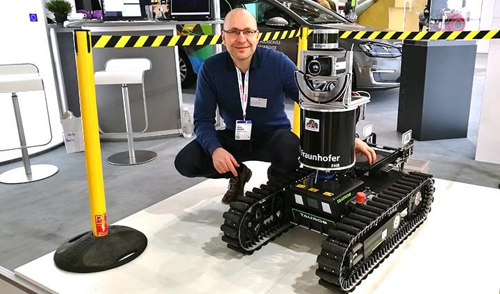 Achim Lilienthal and the robot Smokebot.