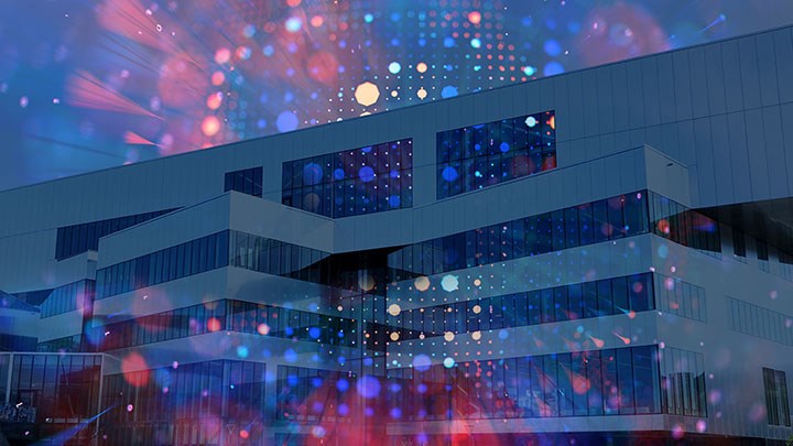 Dekorativ bild med Kulturkvarteret och med färgstarka, abstrakta ljuspunkter och mönster framför byggnaden.