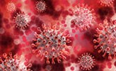 En bild som föreställer ett rött coronavirus.