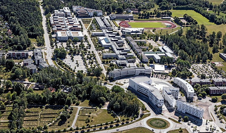 Örebro University’s Campus Örebro from above showing buildings, roads and the surrounding nature.