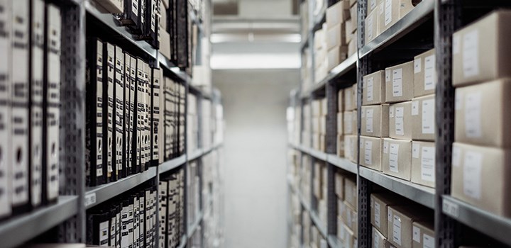 Photo of  shelves full of boxes.