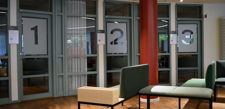 Photo of doors to three tutoring rooms