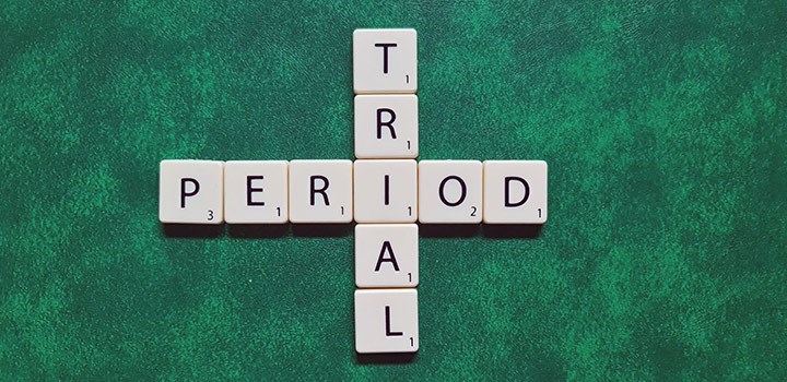 Photo of Scrabble letters forming the words "trial" and "period".