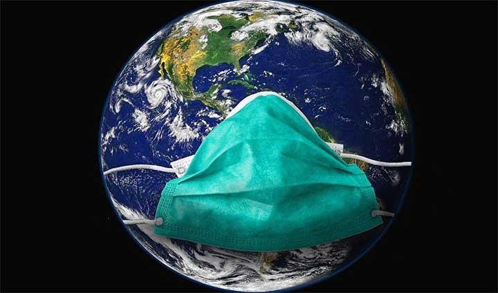 Planeten jorden med ett munskydd.