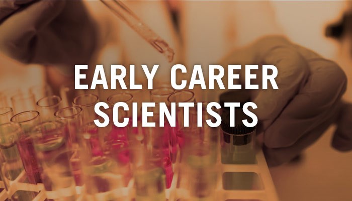 Hands with test tubes and the text Early Career Scientists