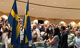 The graduation ceremony opened with folk music and a flag parade in the University Library’s assembly hall.