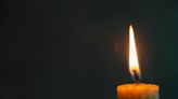Photo of a lit candle.