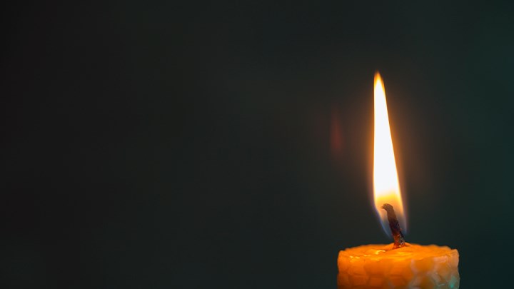 Photo of a lit candle.
