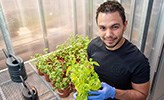 Victor Castro-Alves in the greenhouse.