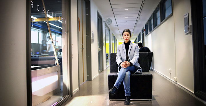 Amy Loutfi, pro-vice-chancellor for artificial intelligence at Örebro University, sits outside the Robotlab.