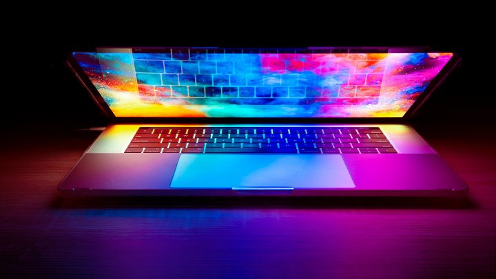 A laptop with bright colours on the screen.