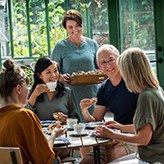 People getting together over a Swedish fika