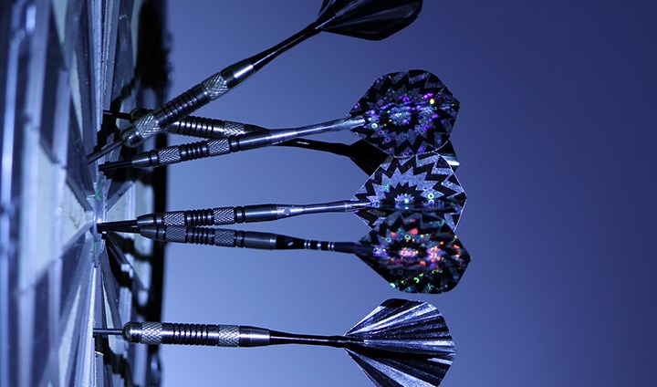 Dartboard with darts.