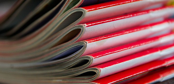 Photo of a stack of journals.