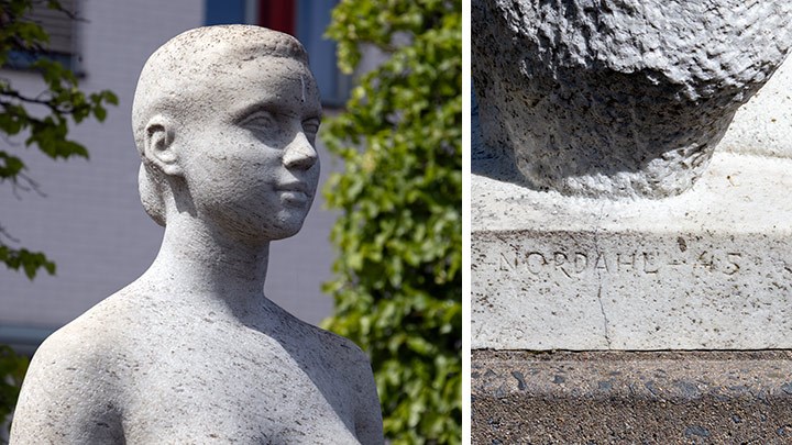 Detaljer på Krakaystatun: huvudet och konstnärens signatur.