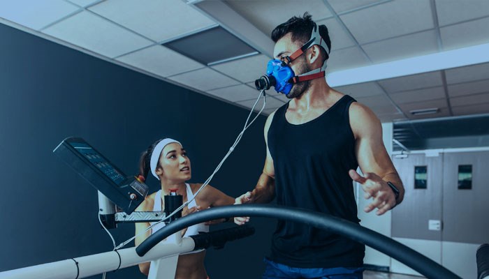 A man is training in a lab.