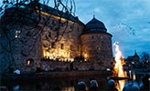 Örebro slott med kör och majbrasa.